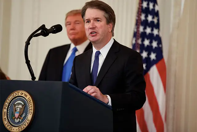 Brett Kavanaugh, with President Trump in the background, on July 9, 2018